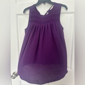 Sleeveless back tie neck blouse